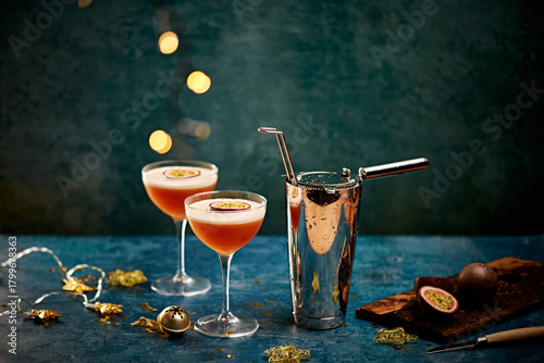 Passionfruit Cocktails with Shaker on Festive Holiday Table