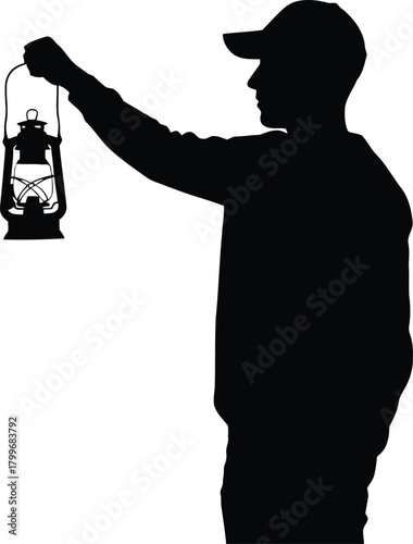 Silhouette of a person holding an oldfashioned oil lantern, isolated on white background