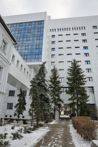Modern hospital building in winter.