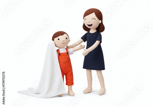 Mother and son playing hide and seek with a white blanket, symbolizing playful family moments