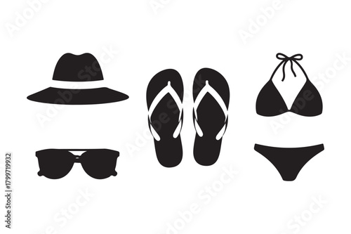 Black silhouette of beach vacation essentials