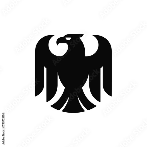 Stylized black eagle emblem on white background