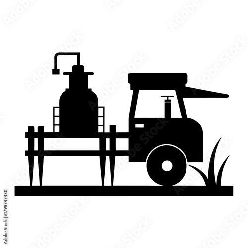 Silhouette of a vintage water pump on a cart