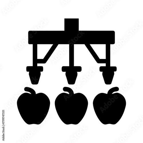 Automated harvesting system picking apples from tree