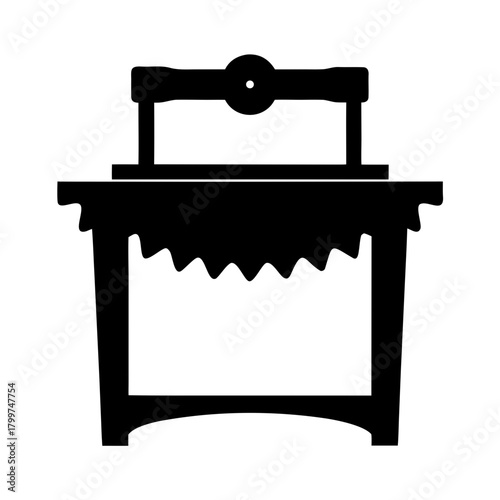 Silhouette of an antique printing press on a table