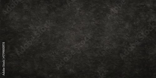 Dark gray vintage textured paper backdrop with black grunge surface and rough concrete wall pattern