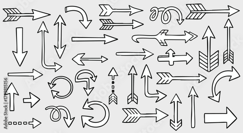 Hand drawn black and white doodle arrows set various shapes and styles isolated on gray background