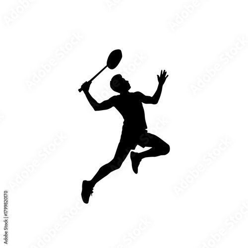 Dynamic silhouette of a badminton player in mid air executing a powerful smash shot