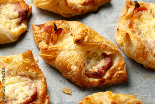 Cheese Bacon Turnovers pastry on baking paper