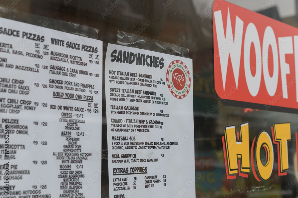 Fototapeta premium menu inside window at Frank Ranalli's Pizza and Italian Beef, a pizza restaurant, located at 185 Baldwin St, Toronto