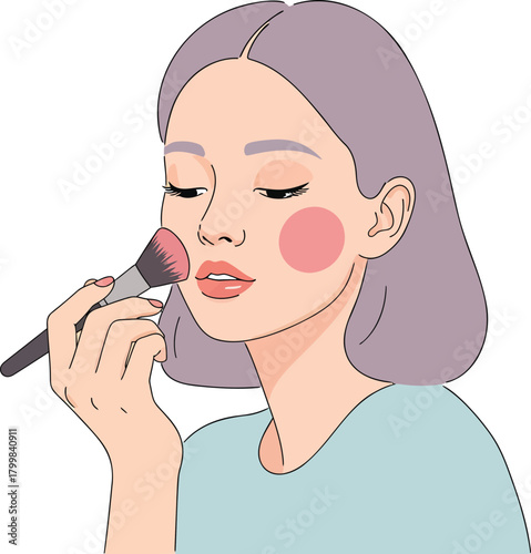 A Young Woman Applying Blush to Her Cheeks