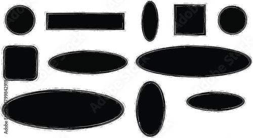 Set of textured black grunge shapes and frames on white background for design
