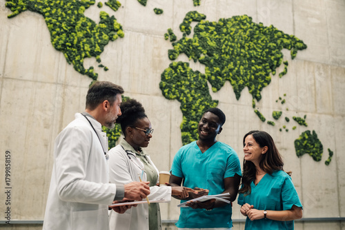 Obraz na plátne Diverse medical team discussing global health solutions