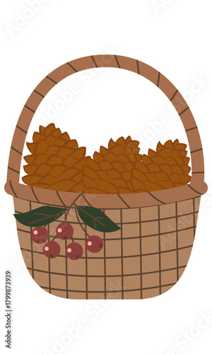  Wicker basket with pine cones and a rowan branch
