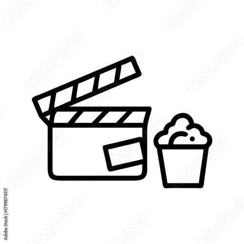 Movie clapper board and popcorn bucket isolated on