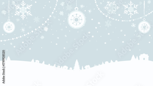 Winter scene with snowflakes and ornaments hanging above a snowy landscape with trees and houses below