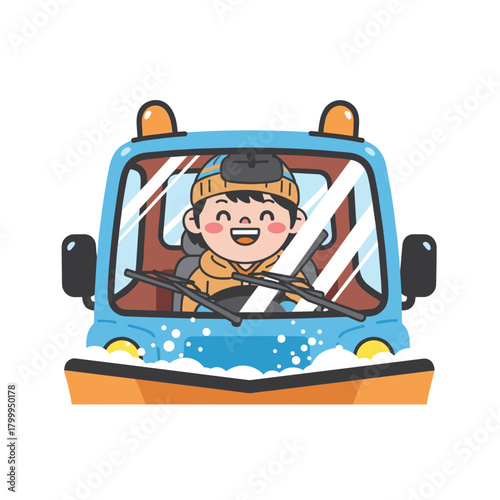 Young boy smiling while driving snowplow in heavy snowfall  