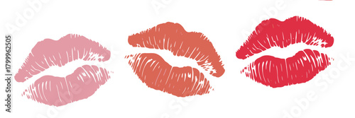 Three Lipstick Kiss Marks in Pink, Coral, and Red on White Background