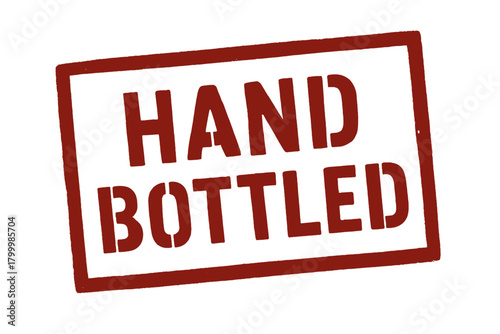 Rectangular stamp HAND BOTTLED stencilstyle uppercase type deep red print edges isolated on white