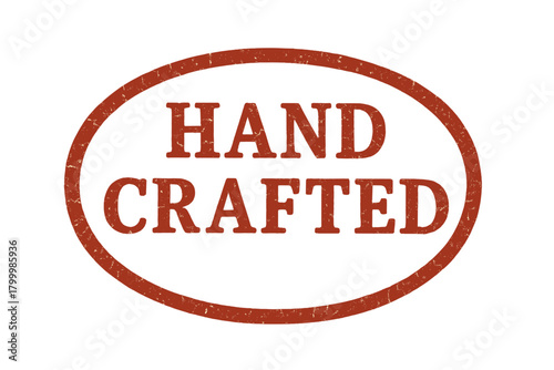 Oval badge HAND CRAFTED uppercase seriffree font cracked red texture classic ink pad effect isolated composition