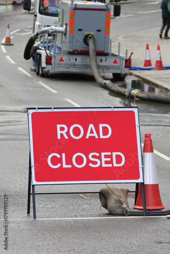 Road closed due to floods sign set up in Shrewsbury Street as flooding from the River Seven over flows on to roads in surrounding area causing congestion and traffic problems.