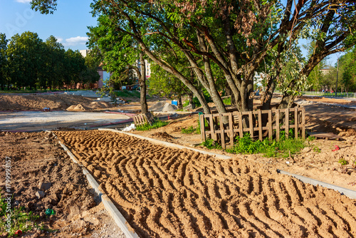 Fotografie Park revitalization project with prepared soil for pathways