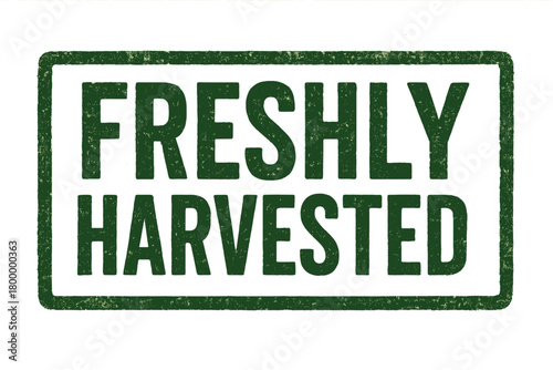 Rectangular label FRESHLY HARVESTED bold condensed letters dark green ink texture pressure rustic stamp look