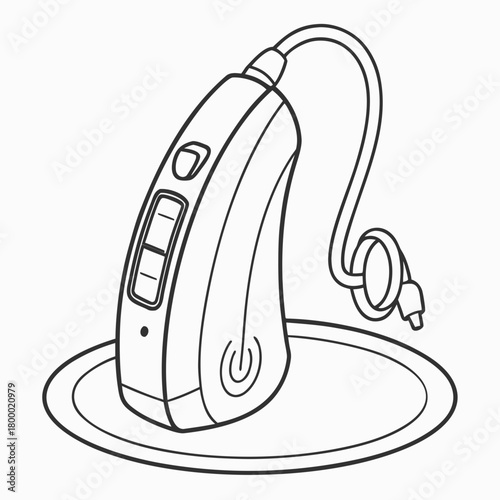 Hearing aid on charging station isolated on