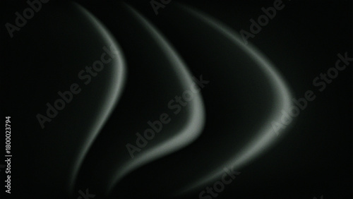 Smooth gray wave-like curves glow softly on a dark background, creating a hypnotic, abstract interplay of light and shadow gradients.