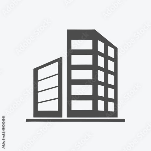 Gray building presents a modern architectural structure against a plain background, with horizontal lines