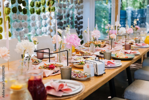 Photography Elegant banquet table with pink flowers and candles, wedding reception decor in