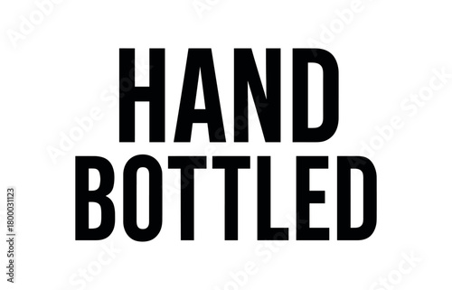 Clean bold typography with text HAND BOTTLED condensed symmetric alignment white background minimal beverage label typography