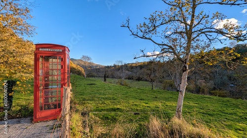 A traditional english red phone booth in Candaneu village, Piloña, Asturias, Spain