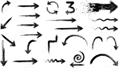 Collection of hand drawn black arrows and directional symbols in various styles and shapes on a white background
