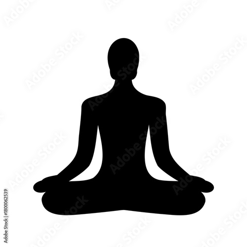Silhouette of a person meditating in lotus position for relaxation purposes