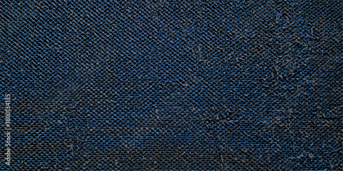 Blue denim fabric texture background, a rough cotton textile material for fashion clothing or canvas backdrop design