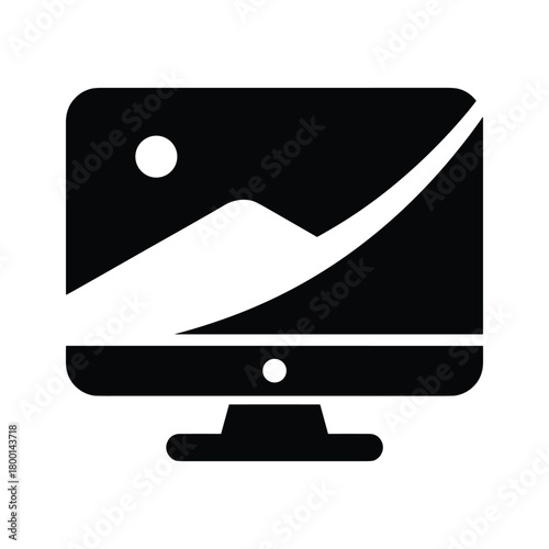 Computer monitor displaying a landscape image