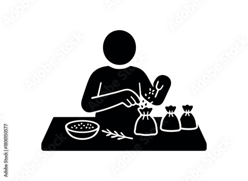 person preparing lavender sachets flat black solid vector illustration isolated on white background