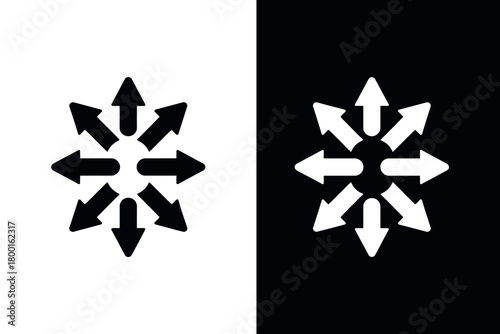 A graphic symbol with multiple arrows pointing outwards from a central point.