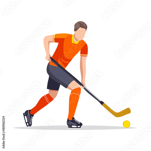 Field hockey player in action with stick and ball