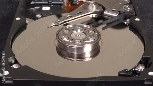 Open hard drive, close-up view, start spin and un-delete the word DATA 