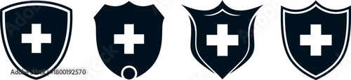 Collection of four stylized shields with white medical crosses