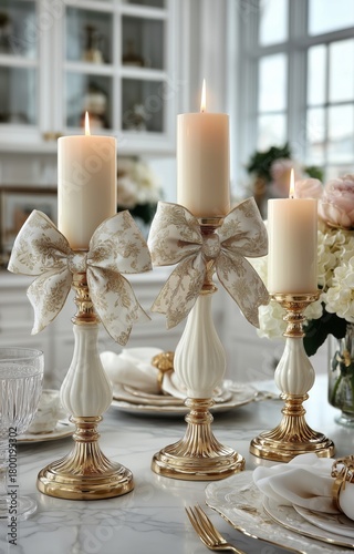 Elegant Table Setting With Golden Candle Holders and White Candles During a S...