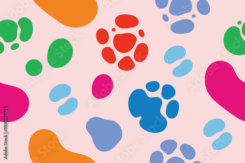 Seamless pattern of colorful abstract organic shapes on a light pink background for textile, wallpaper, wrapping paper and surface design