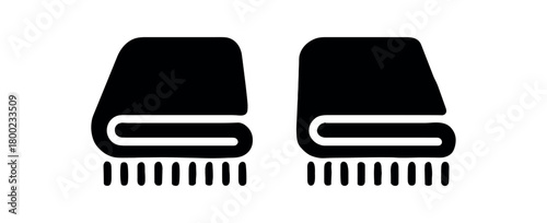 Flat vector illustration two folded blankets black and white solid black icon style simple fringe 2x1 grid equal spacing isolated on white
