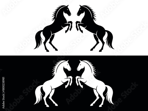 Two pairs of silhouette horses, one black and one white, rear up on hind legs.