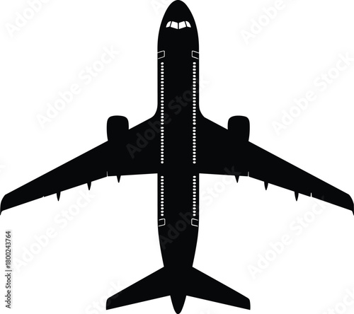 Black silhouette of a commercial airplane viewed from directly above aircraft aviation