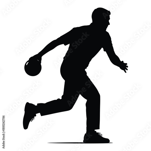 Silhouette of a man bowling with a ball ready to throw
