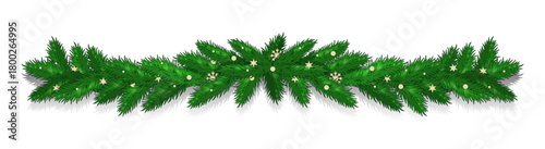 Festive green fir garland with warm white fairy lights draped across a white background