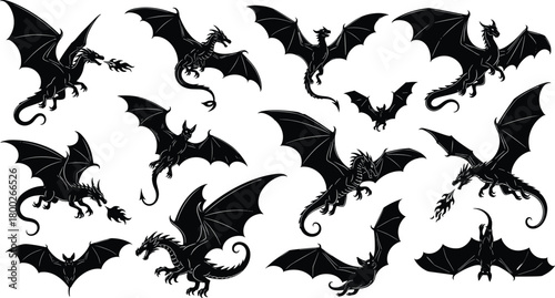 Collection of black silhouette dragons and bats in various flying poses white background